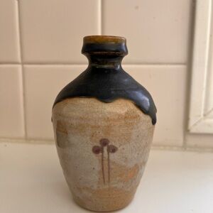 Small ceramic “saki” style vase in brown and beige with flower design